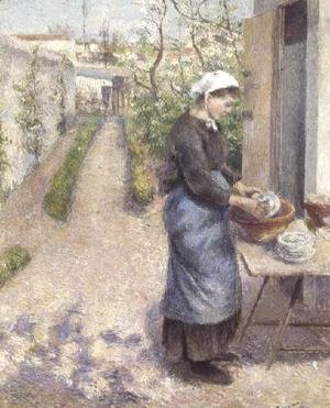 Camille Pissarro - In the Garden at Pontoise: A Young Woman Washing Dishes, 1882